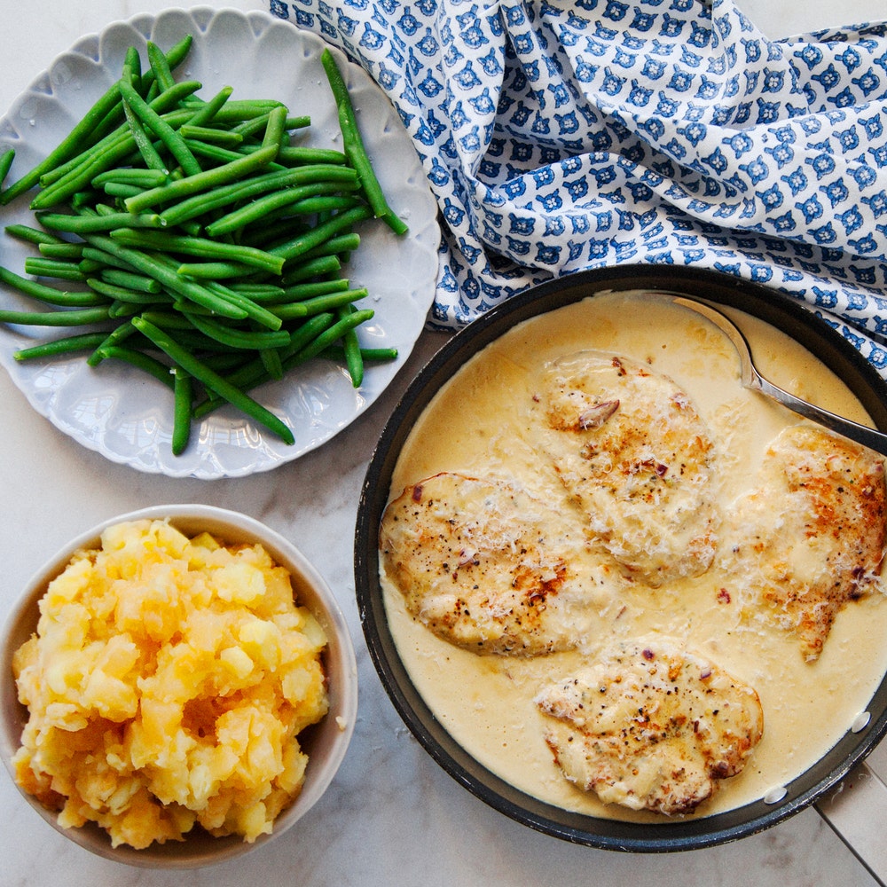 Kyckling i ostsås med potatis- och rotselleristomp