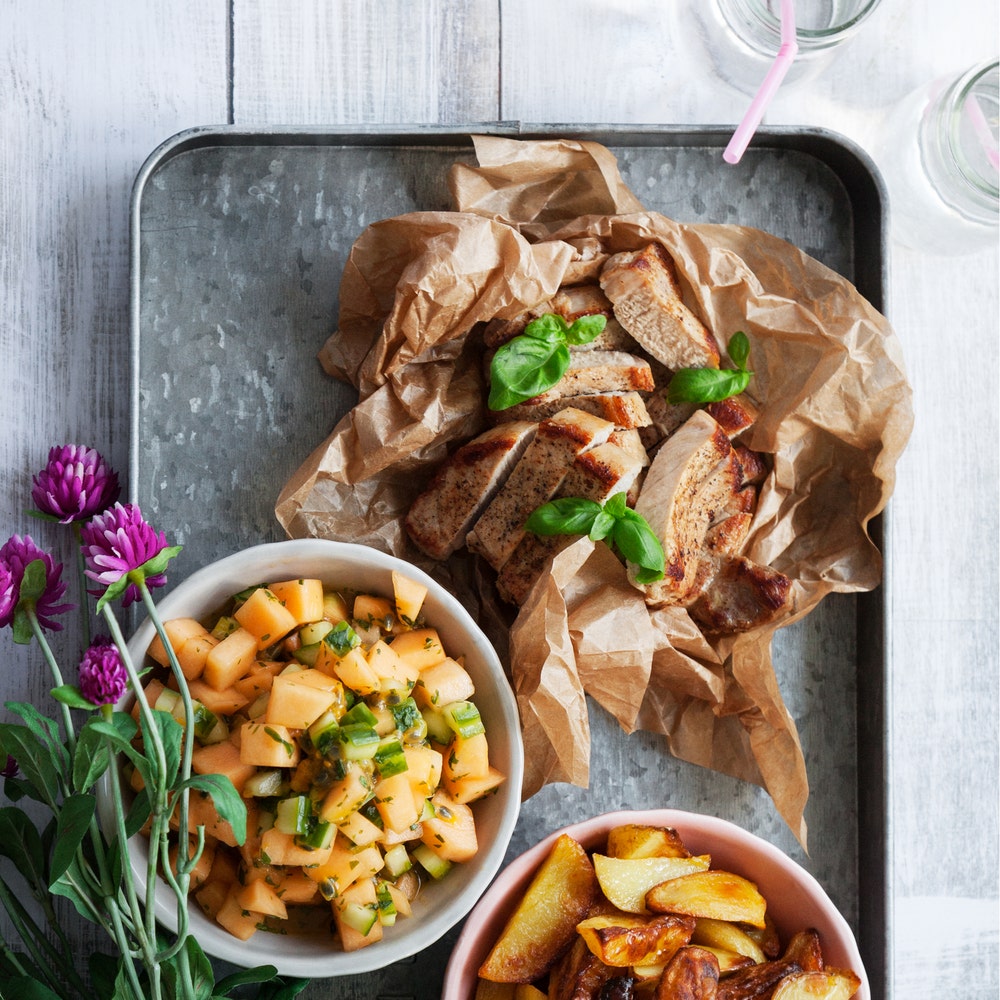 Stekta fläskkotletter med melonsalsa och rostad potatis