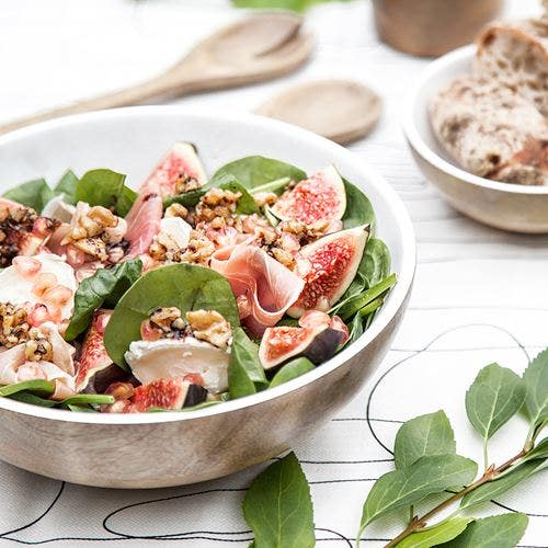 Prosciuttosallad med granatäpple, fikon och getost